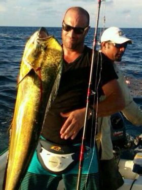 Man holding a fish caught off Pedasi, Azuero Peninsula, Panama – Best Places In The World To Retire – International Living